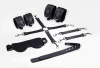 фото Набор Feral Feelings BDSM Kit 5 Black, наручники, поножи, коннектор, маска, паддл